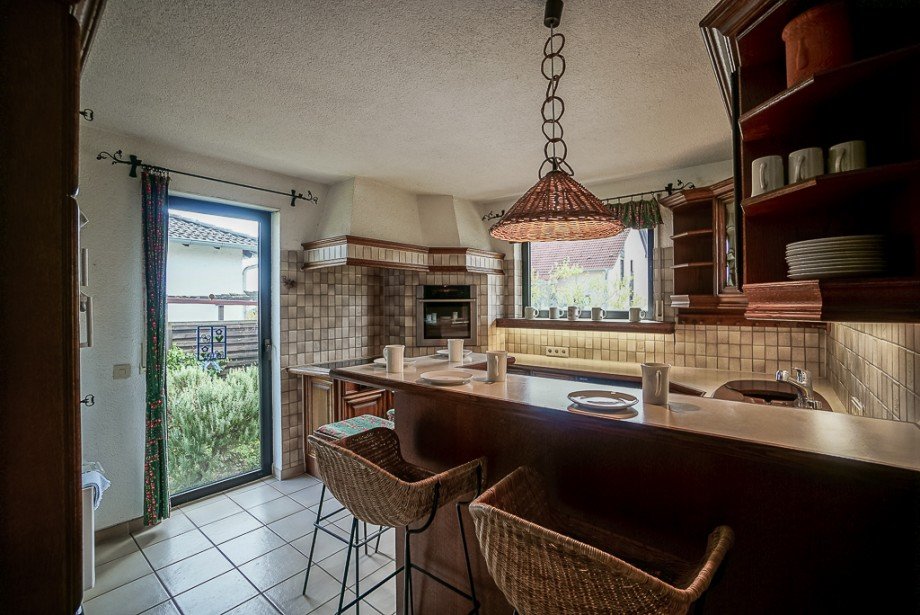 Haus Gau- Bischofsheim - K�hler Immobilien Bungalow Gau-Bischofsheim